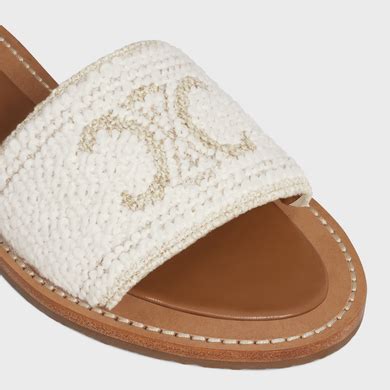 Women's Celine Lympia mules in triomphe jacquard canvas.